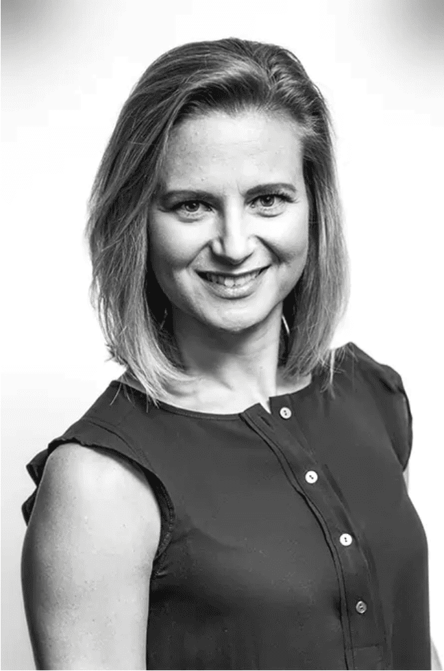 Professional woman smiling, representing BlueWave Resource Partners.