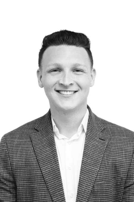Professional male team member at BlueWave Resource Partners.