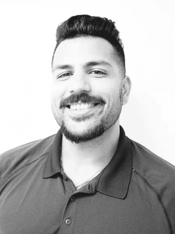 Professional male team member at BlueWave Resource Partners.