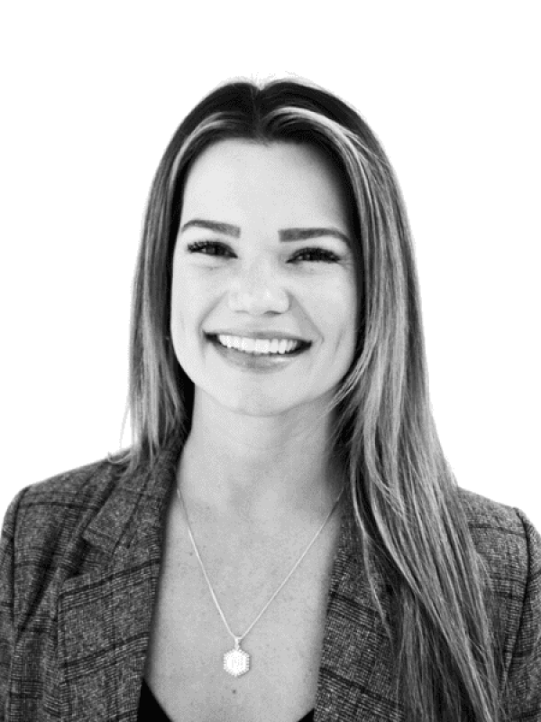 Professional woman smiling, representing BlueWave Resource Partners.