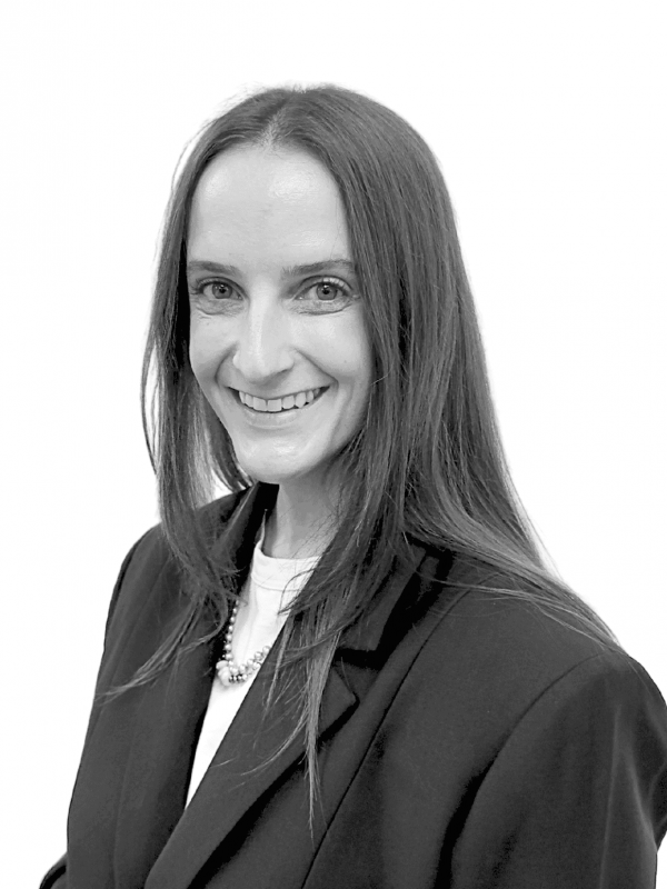 Professional woman representing BlueWave Resource Partners in business setting.