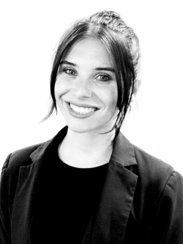 Professional woman smiling, representing BlueWave Resource Partners.