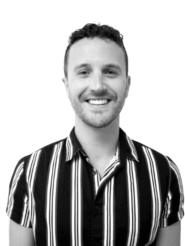 Smiling man in striped shirt representing BlueWave Resource Partners.
