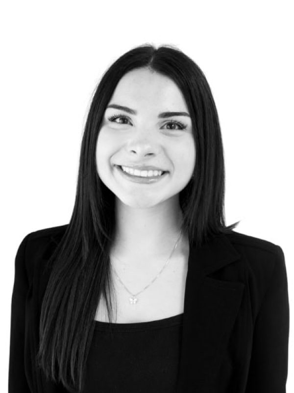 Professional woman smiling, representing BlueWave Resource Partners.